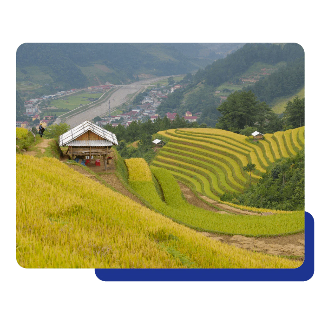 Pure Giving A house on a field with a scenic view of nature.