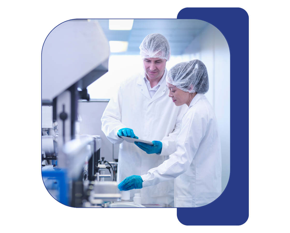 two-scientists Two Pure Encapsulations employees working on formulations in a laboratory.