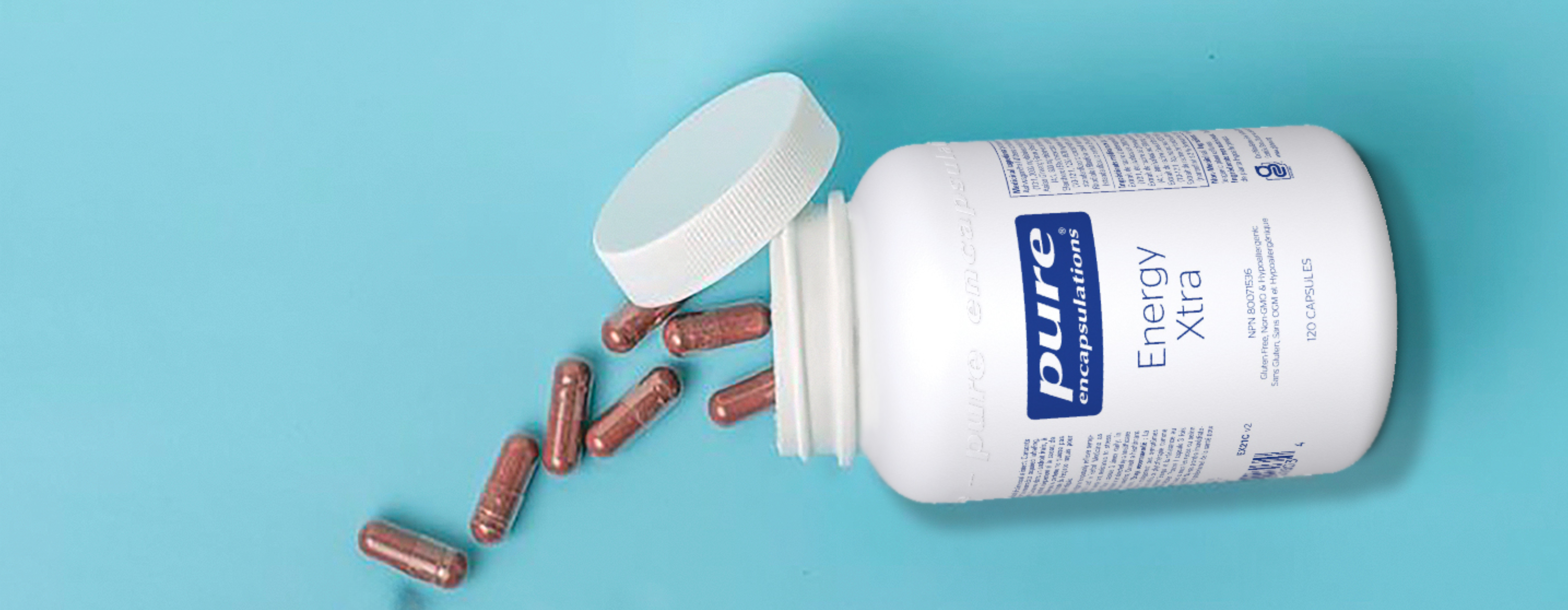 flacon-de-pilules-pure-encapsulations-avec-des-pilules-qui-sortent-en-de-cœur flacon-de-pilules-pure-encapsulations-avec-des-pilules-qui-sortent-en-de-cœur
