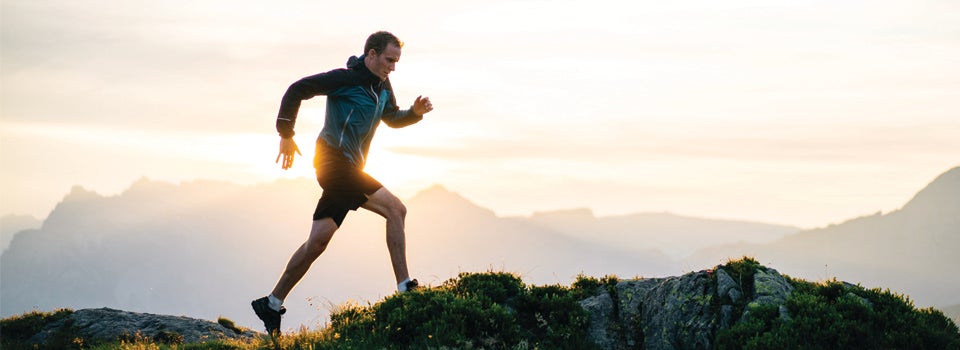 A man running on a mountain