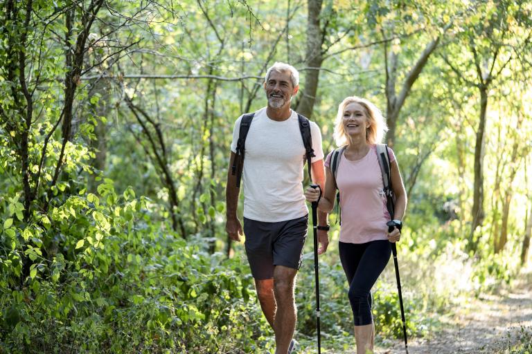 Man and women hiking outdoors