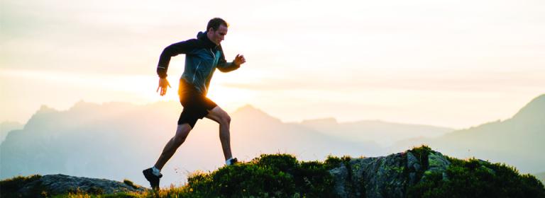 A man running on a mountain