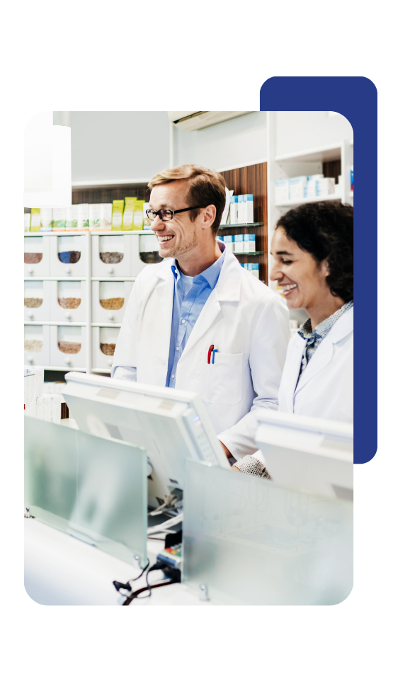 Two Pharmacists interacting with a customer. 