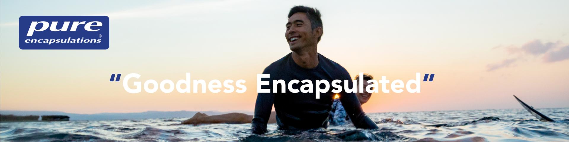 Man smiling and surfing. "Goodness Encapsulated" written and Pure Encapsulations.